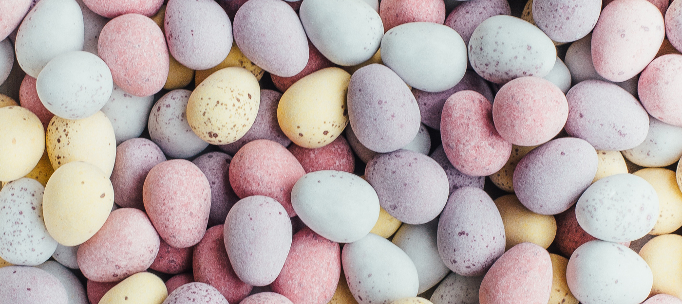 Yellow, purple, pink, and blue pastel easter eggs